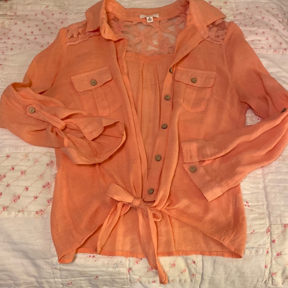 Coral button down with tie at the bottom. Size S.